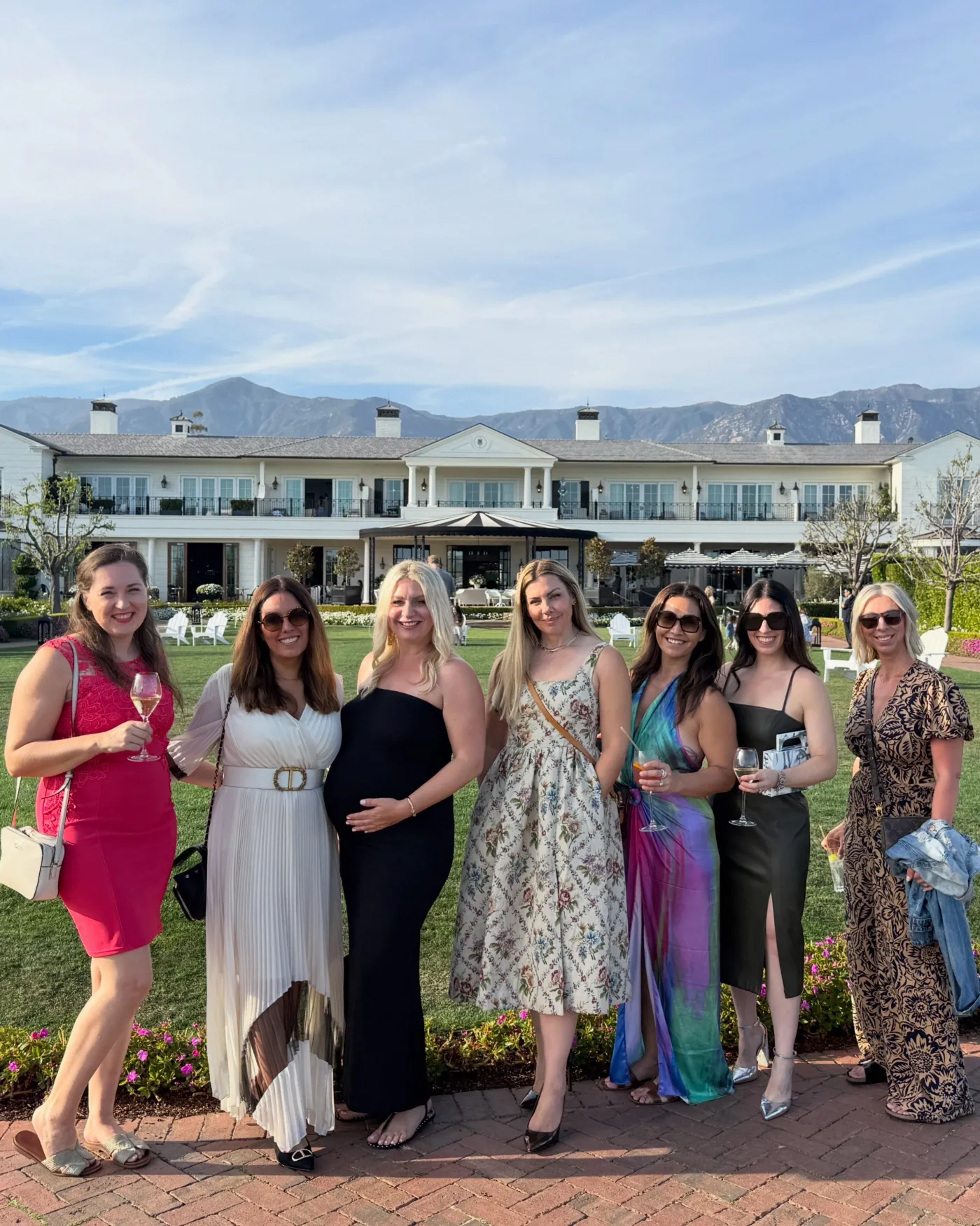 Emily Williams with guests outdoors at her Montecito event